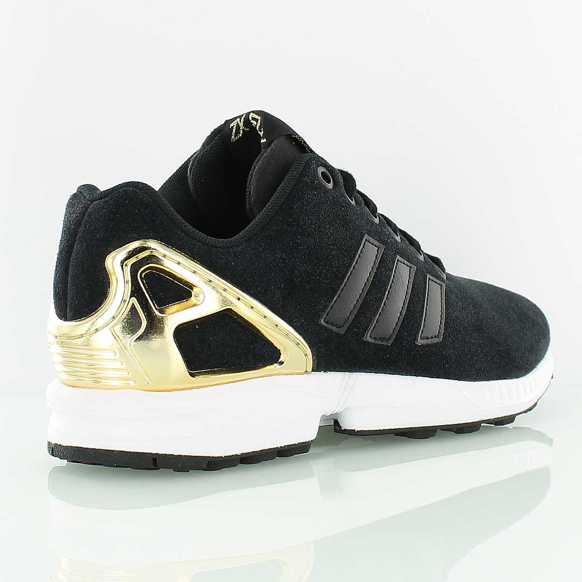 zx flux femme noir et doré