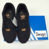 baskets adidas noir et or
